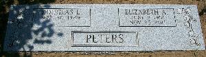 flat granite companion headstone with name panels and ivy design